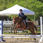 Apricot Glow ridden by CV Equestrian riding student Anna Kay Bass showing in the 2'3" Hunter division at Cavallo Farms.
